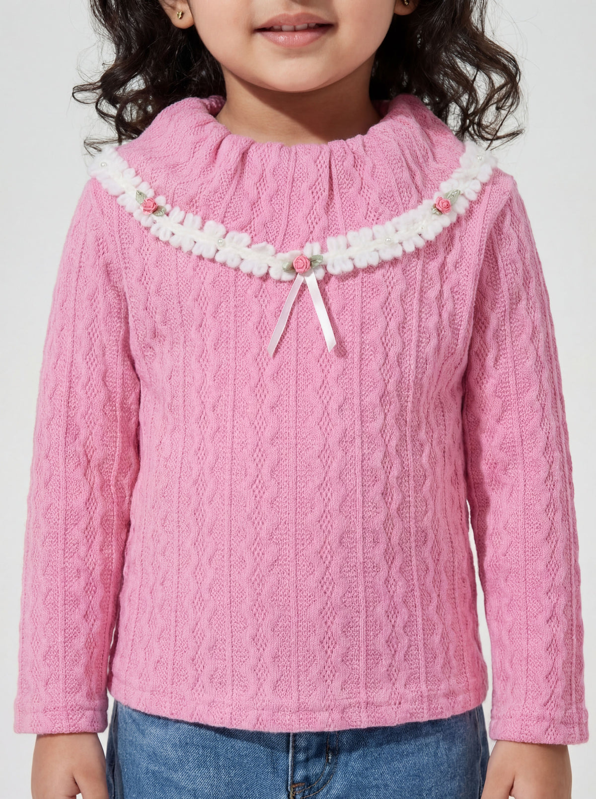 Pink woollen top with lace detailing