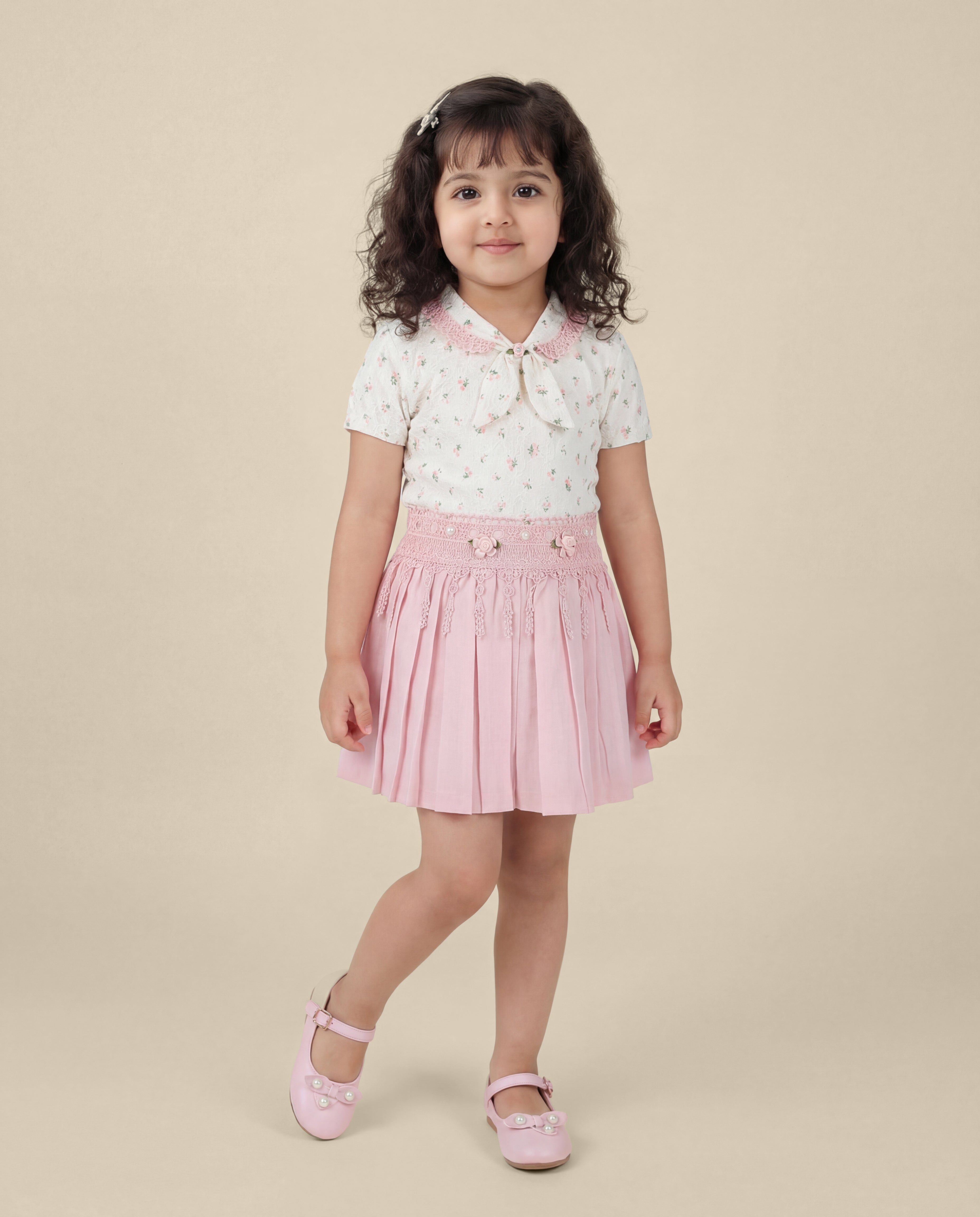 Floral print top with light pink skirt