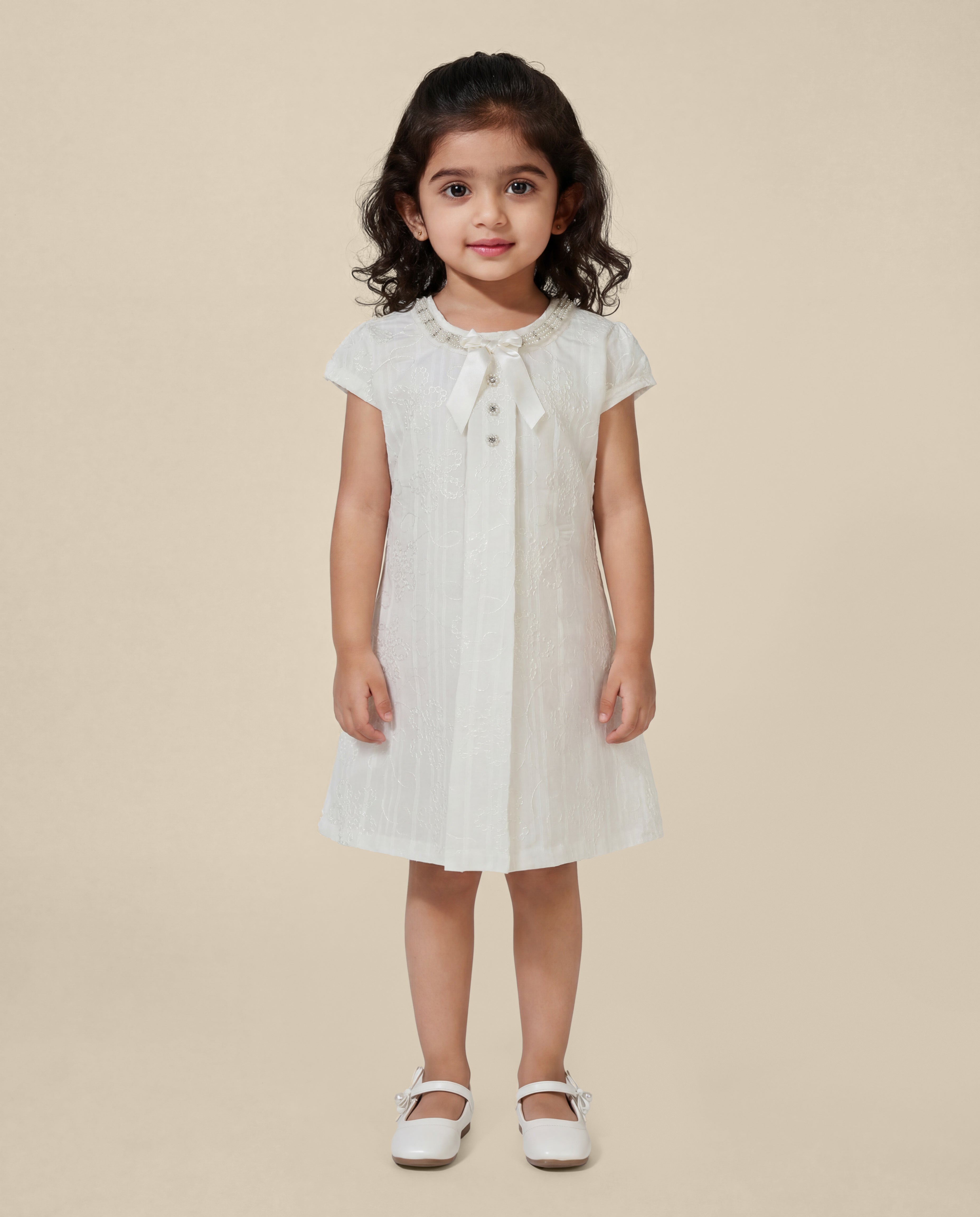 Embroidered dress with pearl detailing