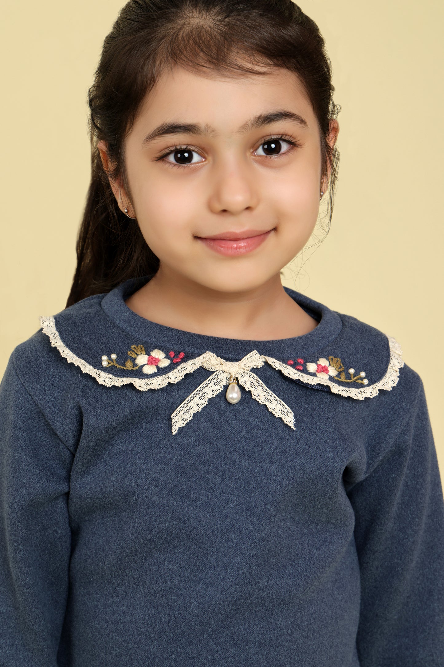 Navy top with embroidered collar