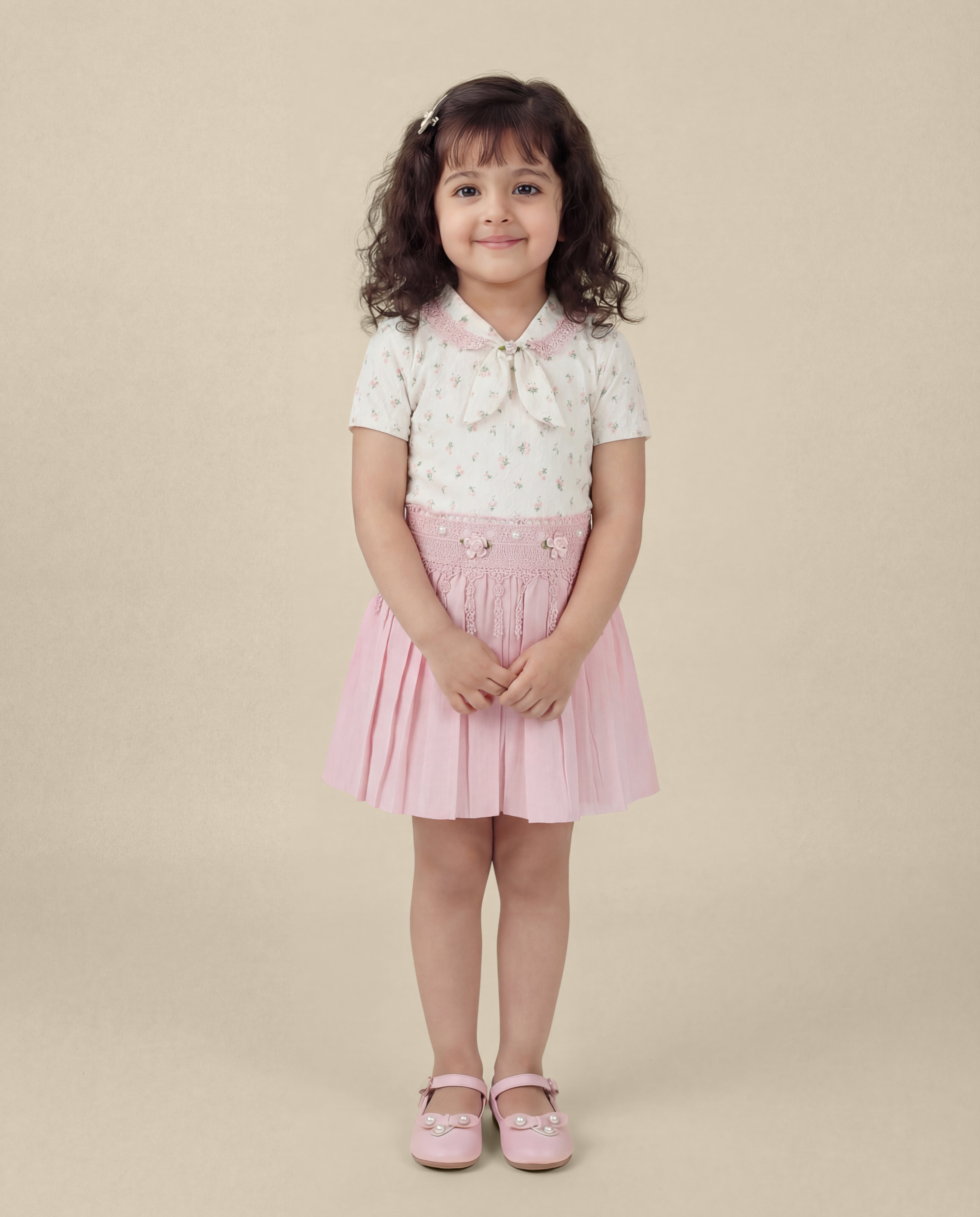 Floral print top with light pink skirt