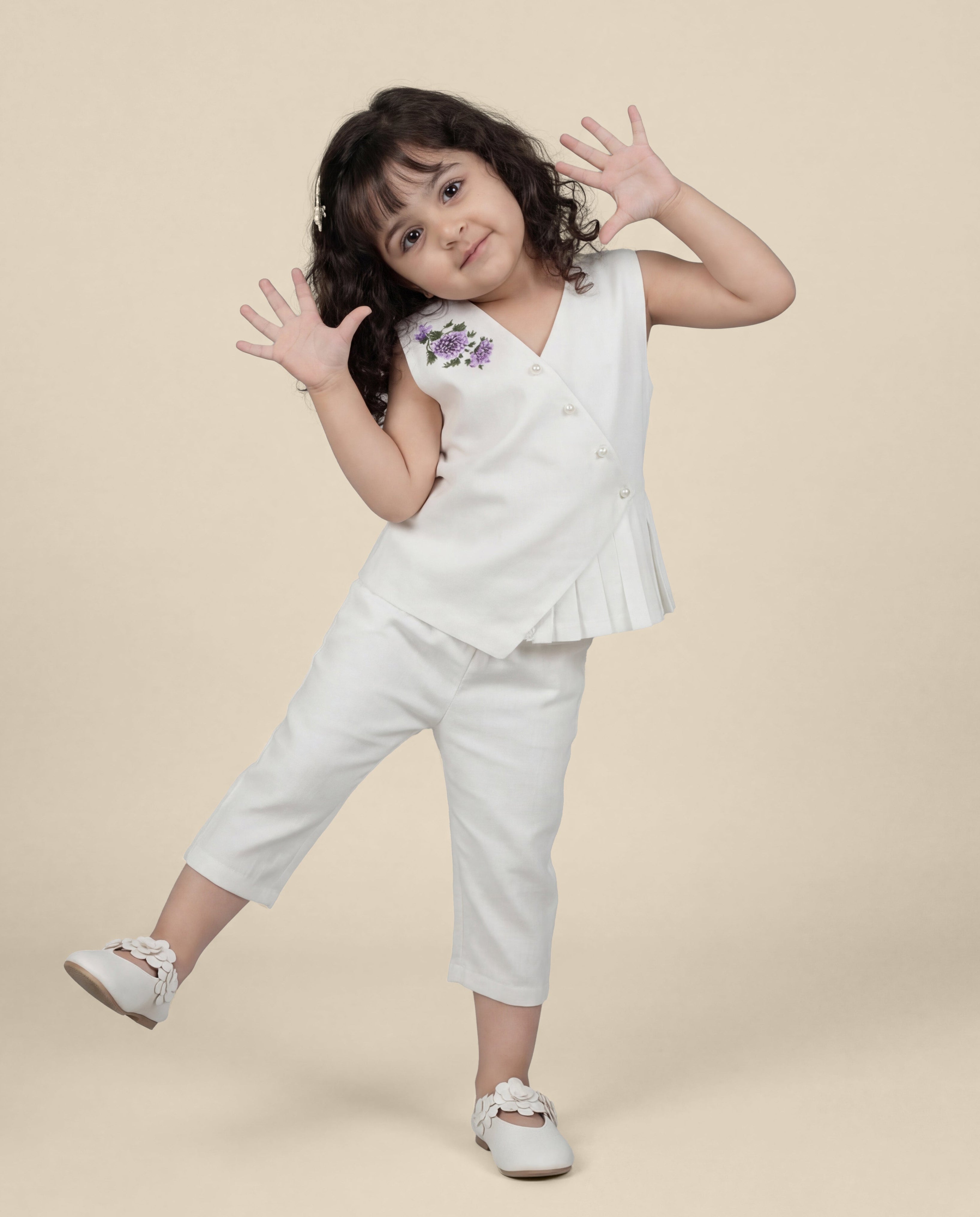 Cream linen co-ord with floral detailing