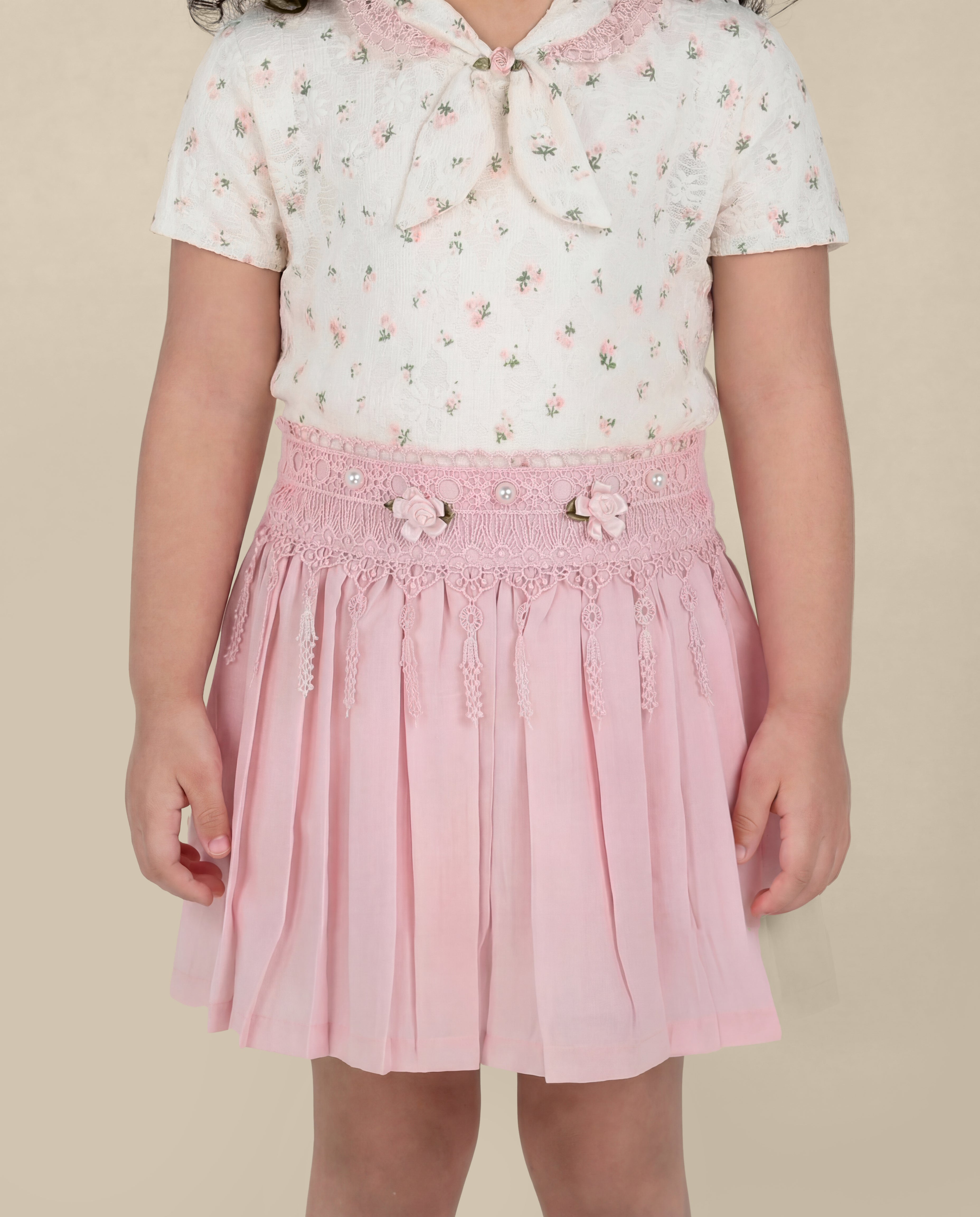 Floral print top with light pink skirt
