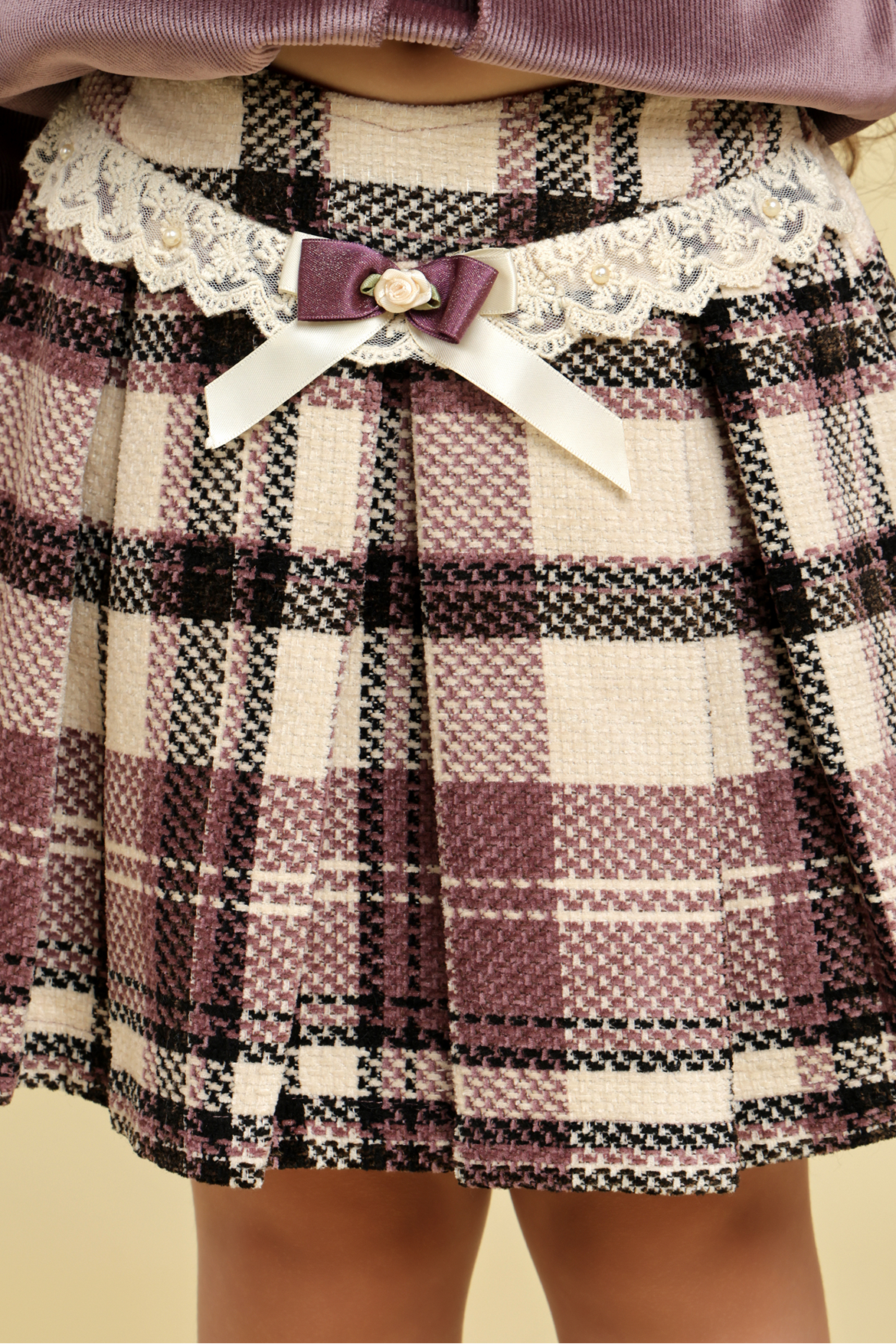 Lilac velvet top with checkered skirt