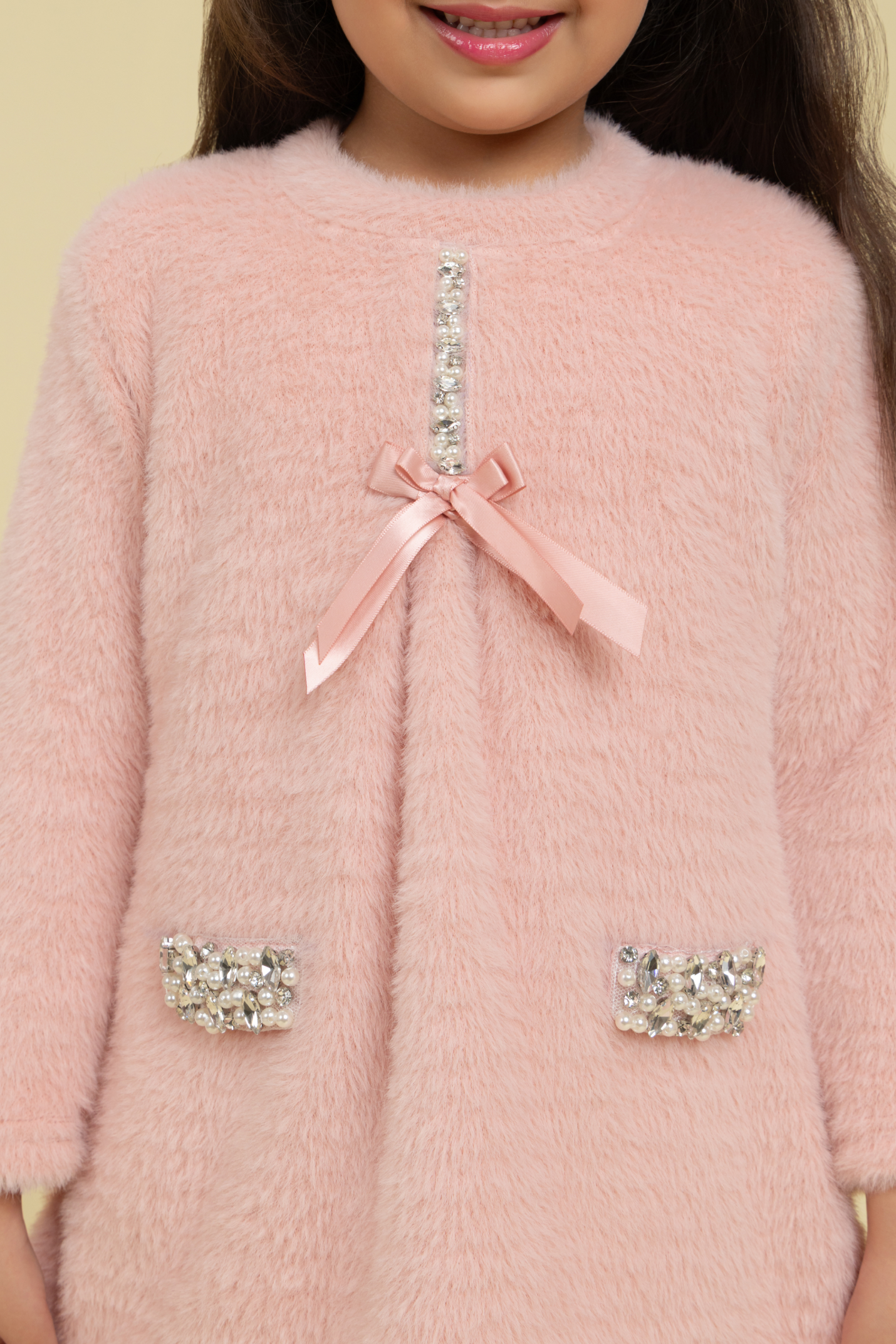 Pink woollen dress with embellishment
