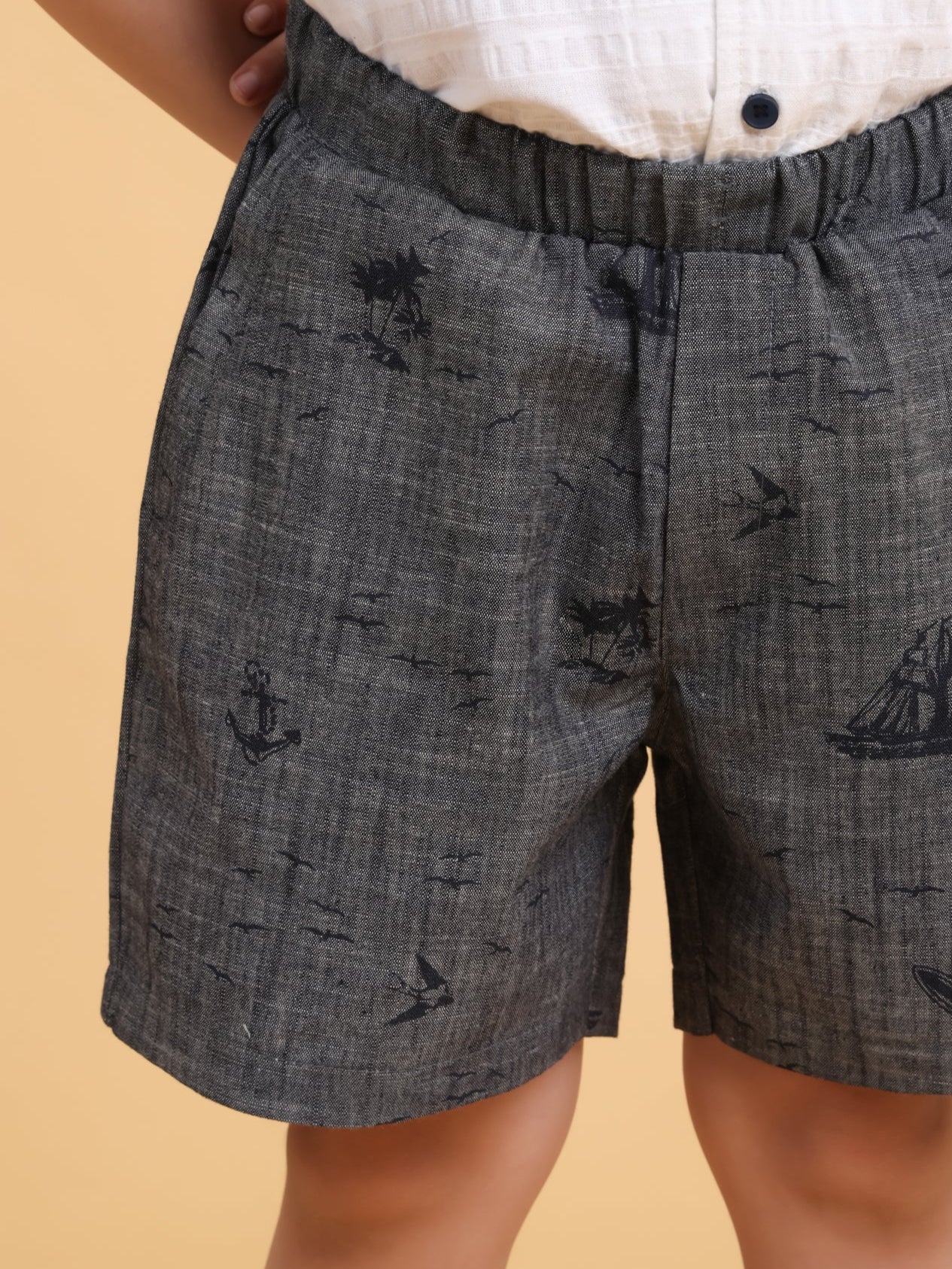 White shirt with embroidery and printed cotton denim shorts