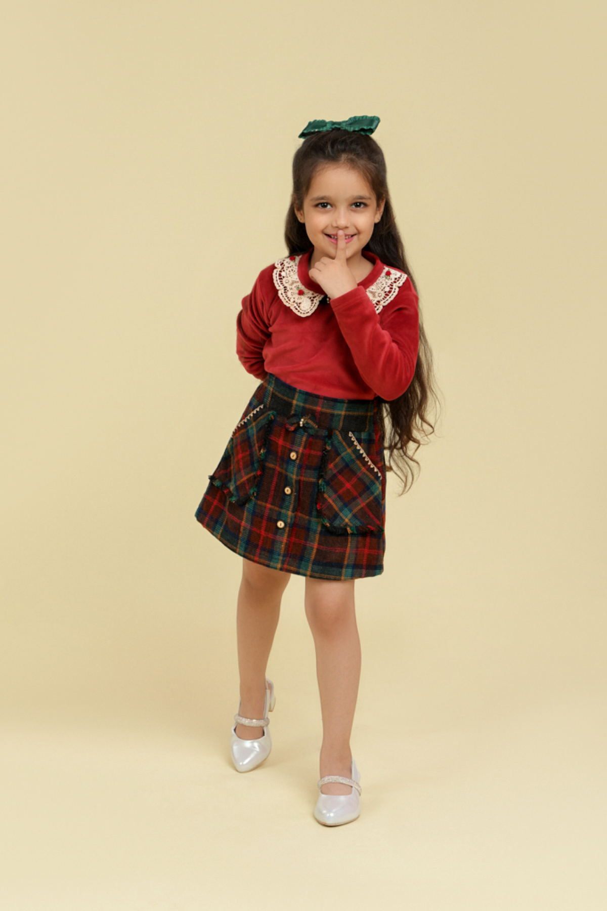 Maroon top with checkered skirt