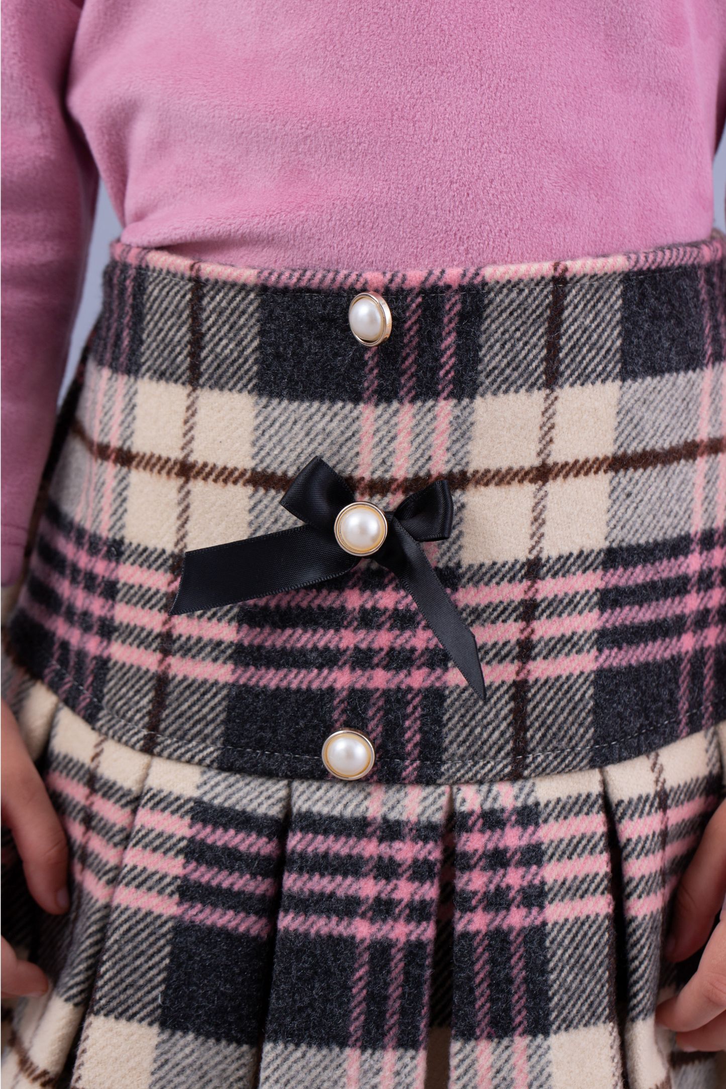 Wisteria pink top and checkered skirt