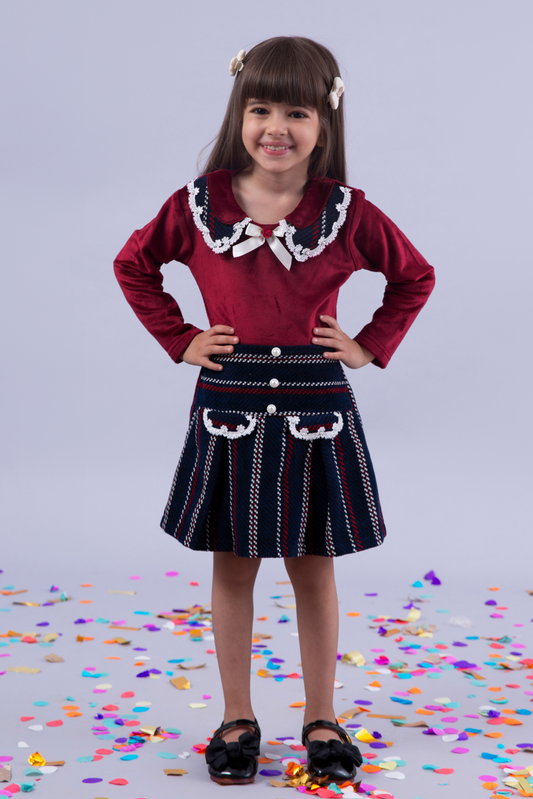 Maroon top with maroon and navy skirt