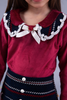 Maroon top with maroon and navy skirt