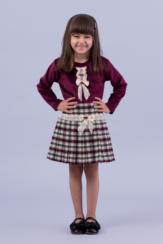 Plum top with checkered skirt