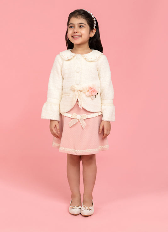 Formal buttoned top with baby pink skirt