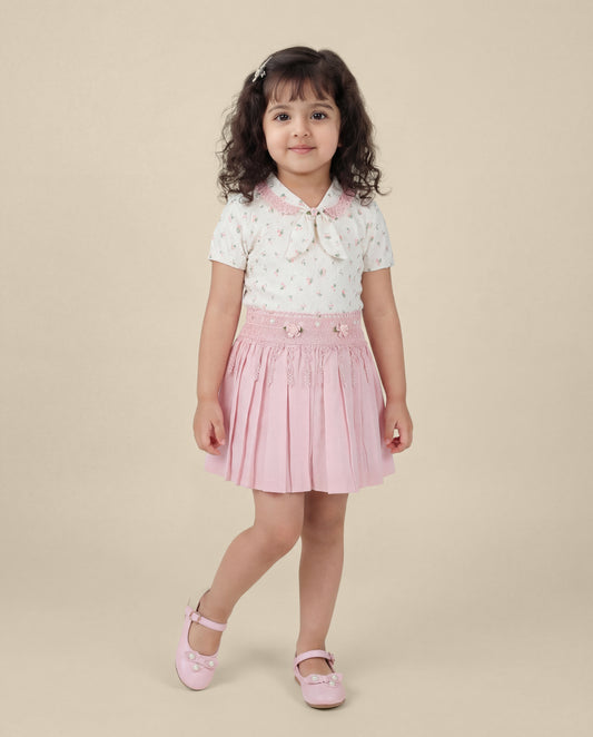 Floral print top with light pink skirt
