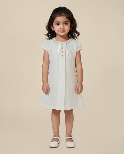 Embroidered dress with pearl detailing