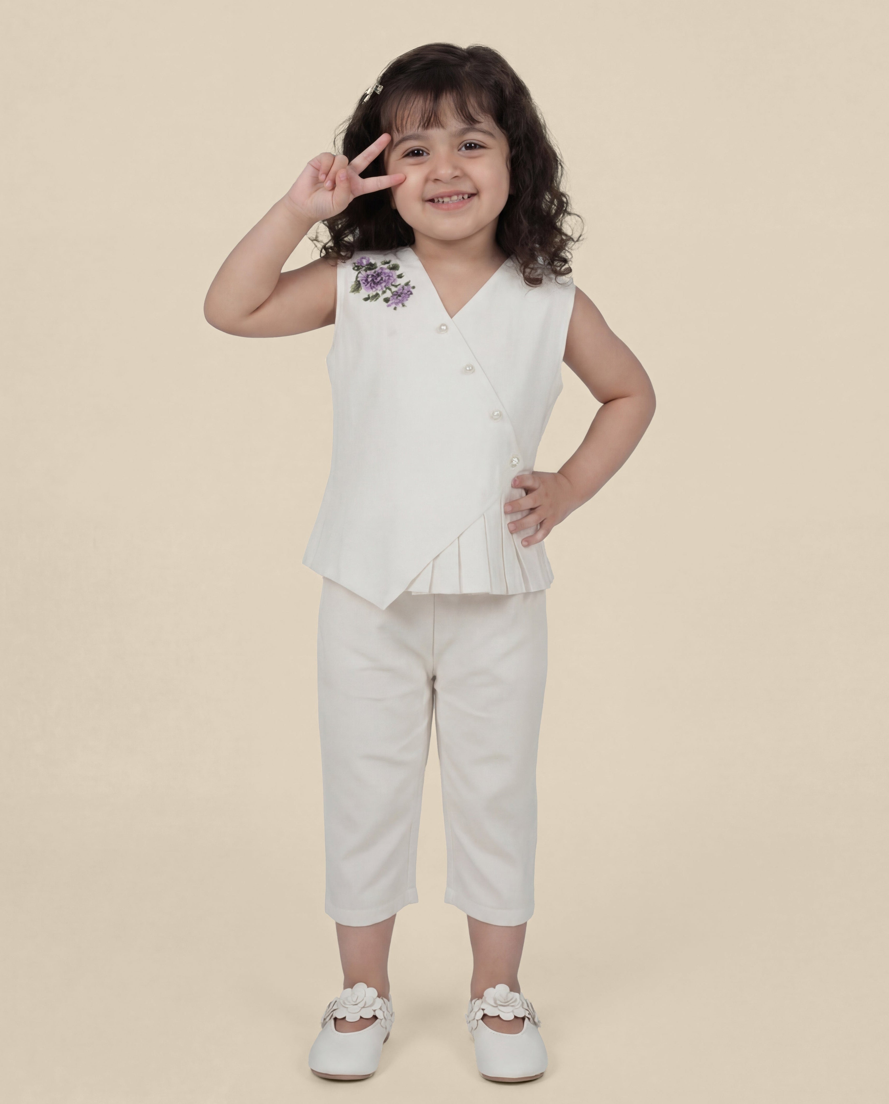 Cream linen co-ord with floral detailing