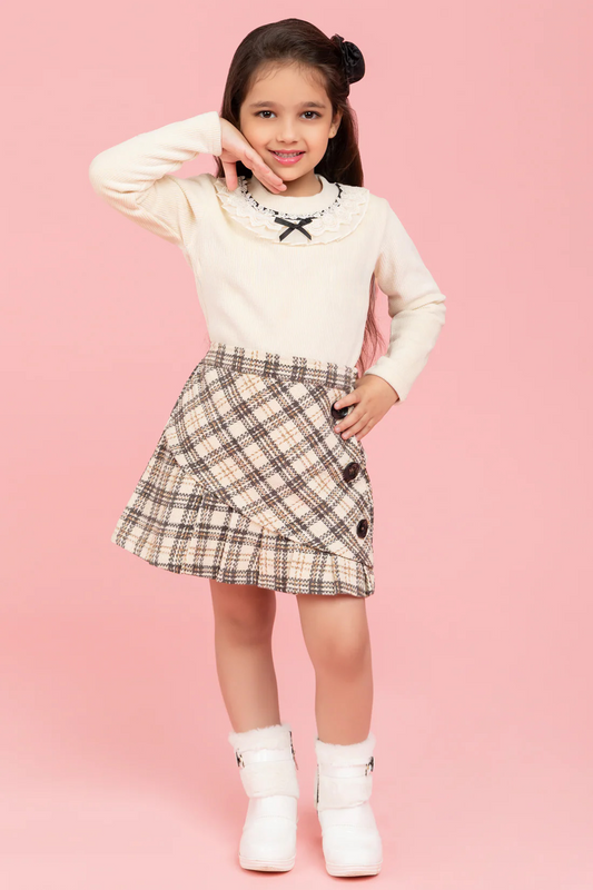 Cream top with fancy collar and checkered skirt