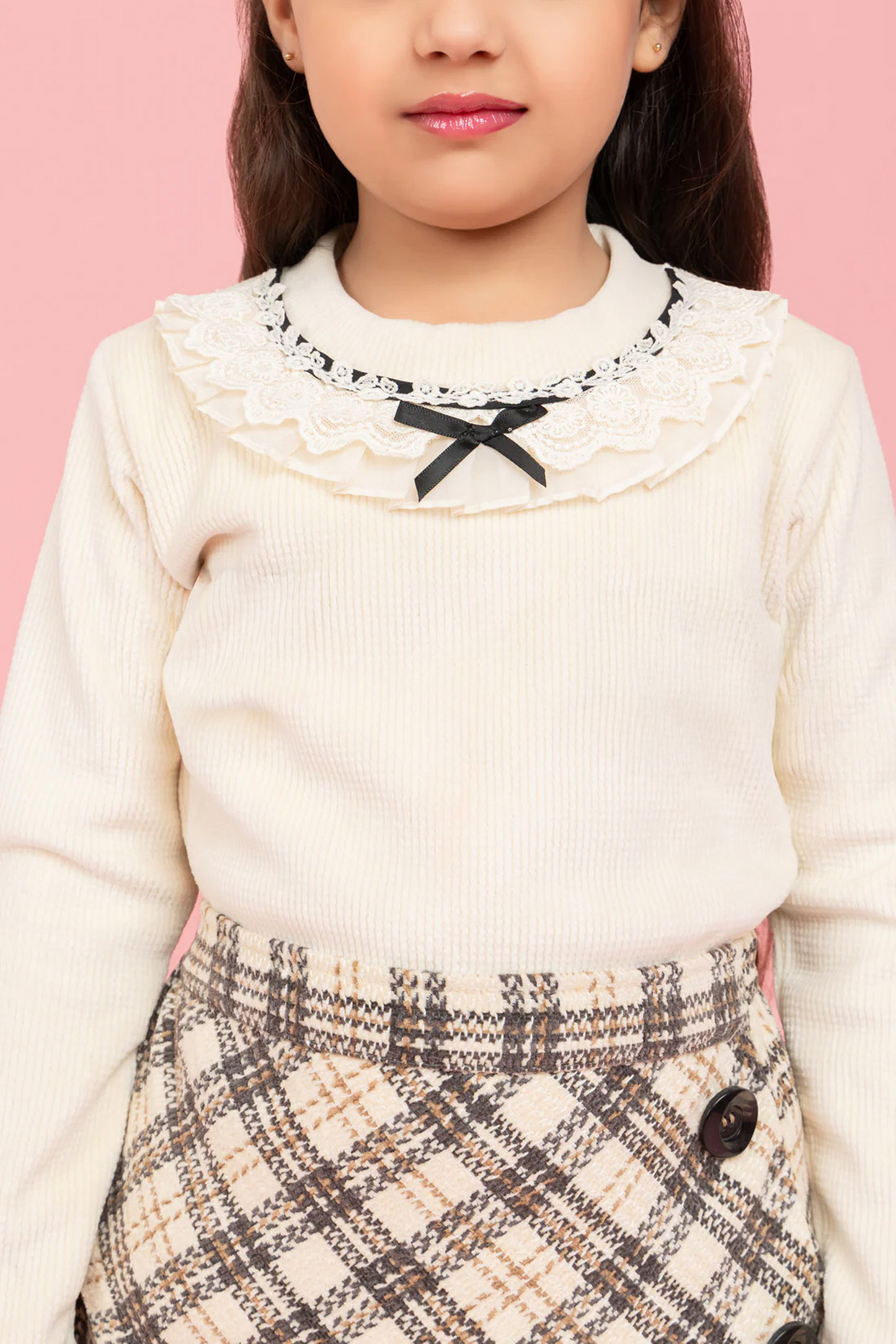 Cream top with fancy collar and checkered skirt
