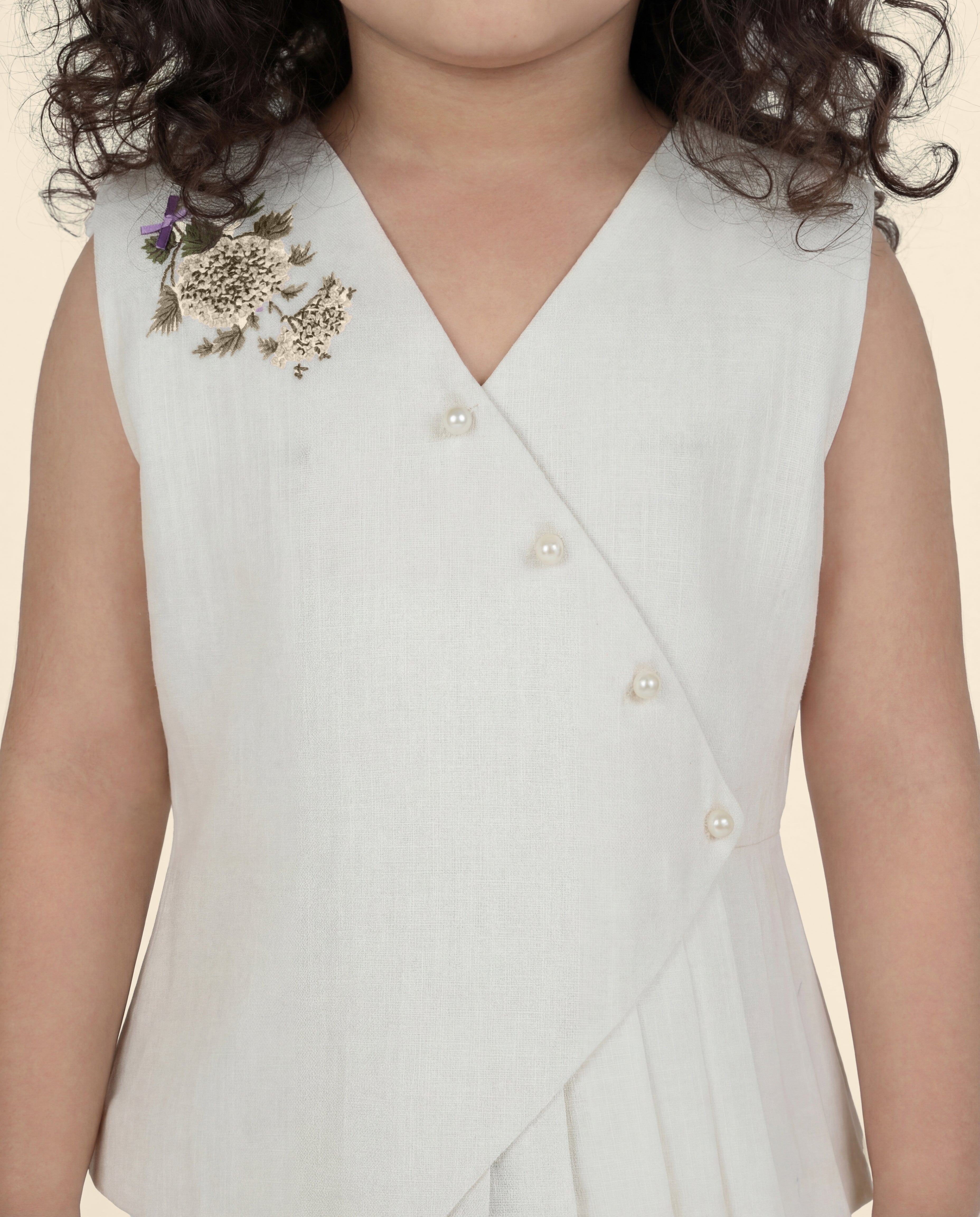 Cream linen co-ord with floral detailing