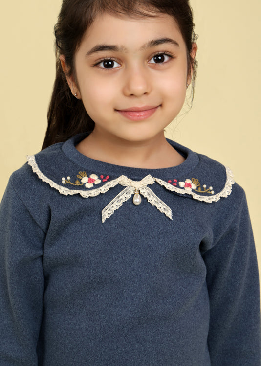 Navy top with embroidered collar