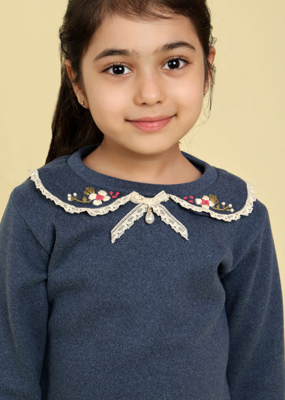 Navy top with embroidered collar