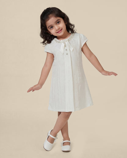 Embroidered dress with pearl detailing