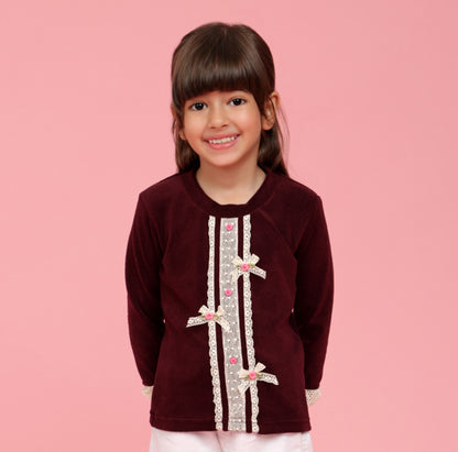 Maroon top with lace bows