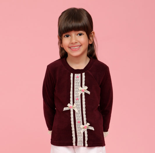 Maroon top with lace bows