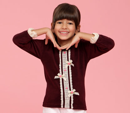 Maroon top with lace bows