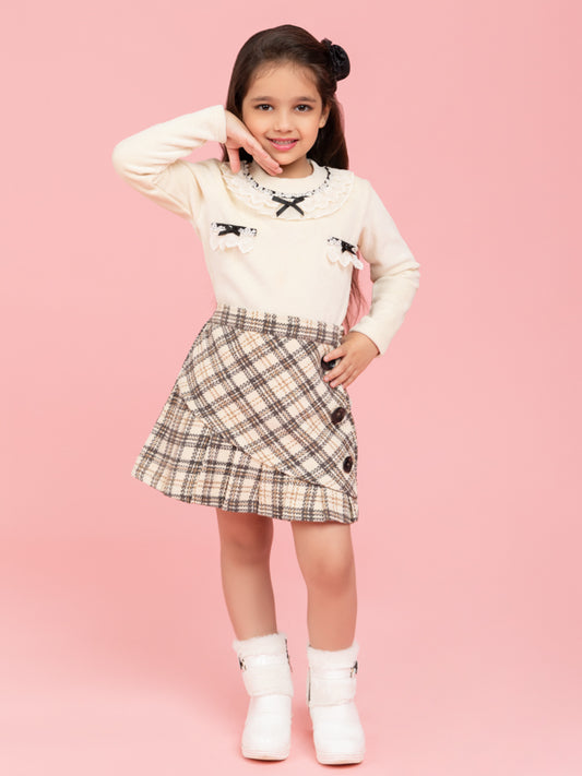Cream top with fancy collar and checkered skirt