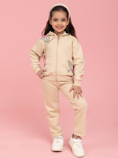 Beige tracksuit with printed flowers