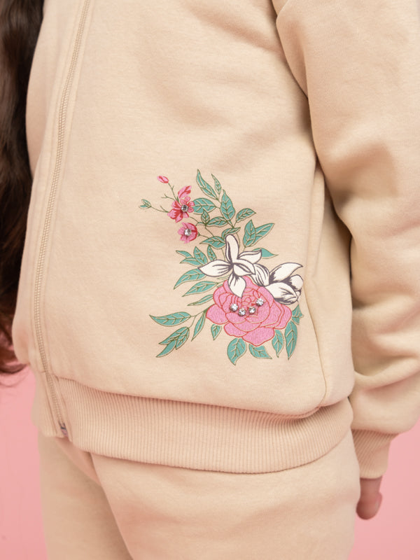 Beige tracksuit with printed flowers