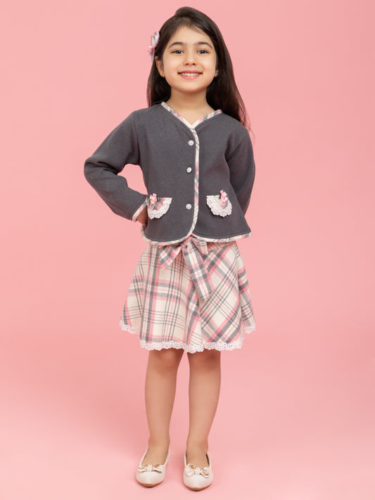 Grey buttoned top with checkered skirt