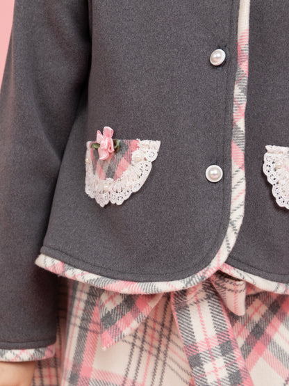 Grey buttoned top with checkered skirt