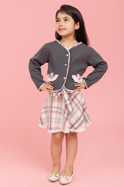 Grey buttoned top with checkered skirt