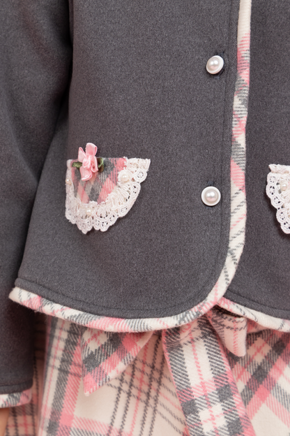 Grey buttoned top with checkered skirt