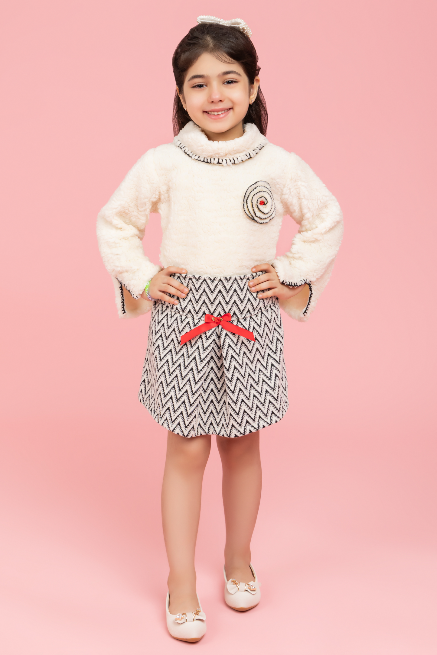 Soft cream top with black and white zig zag skirt