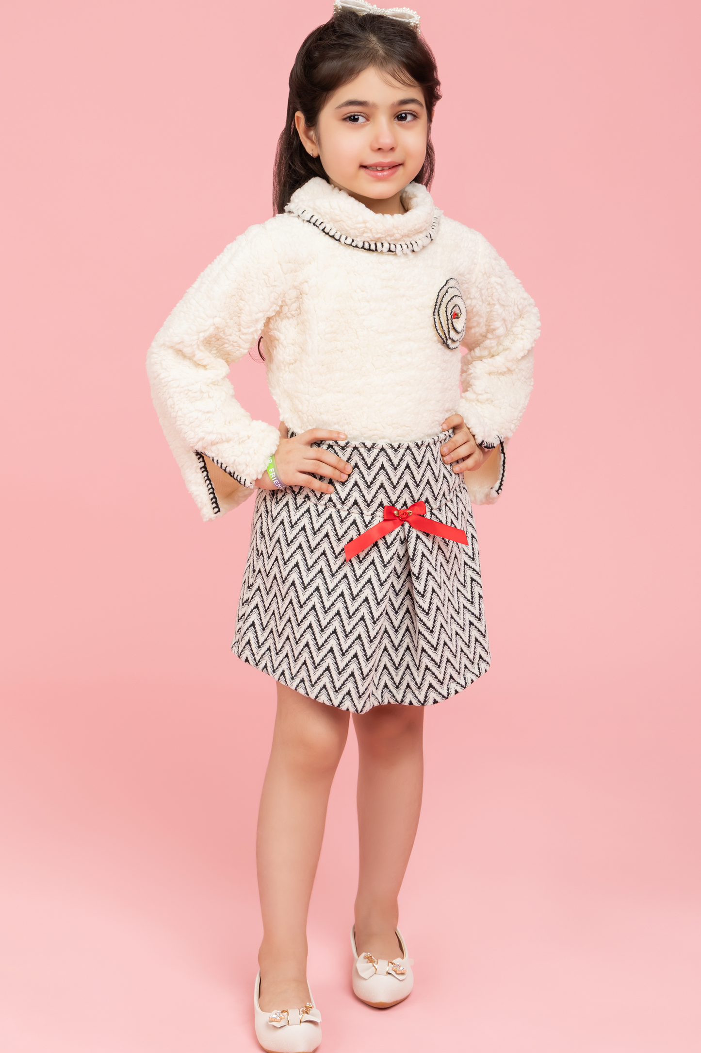 Soft cream top with black and white zig zag skirt