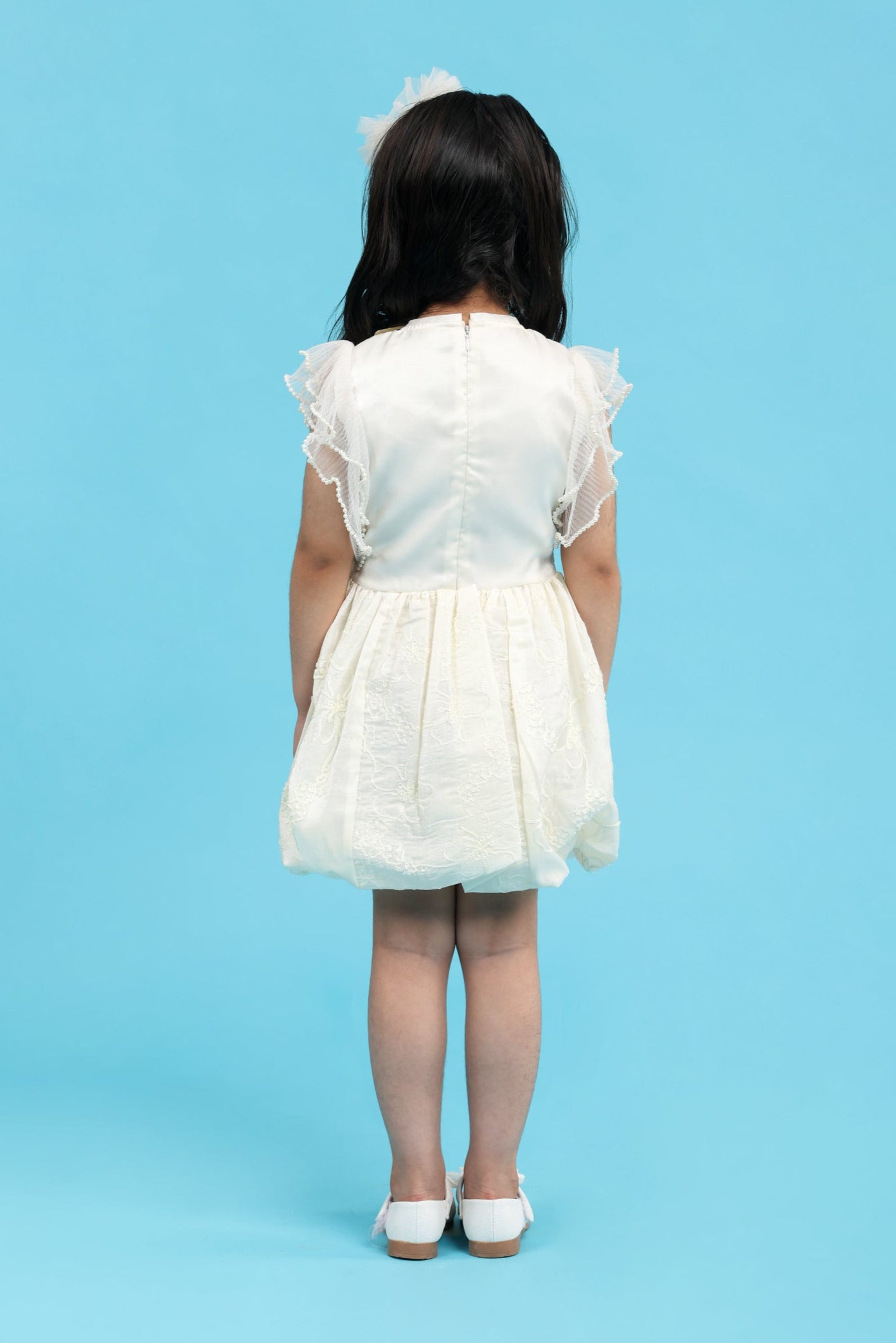 Fancy cream embroidered dress with tie up bow