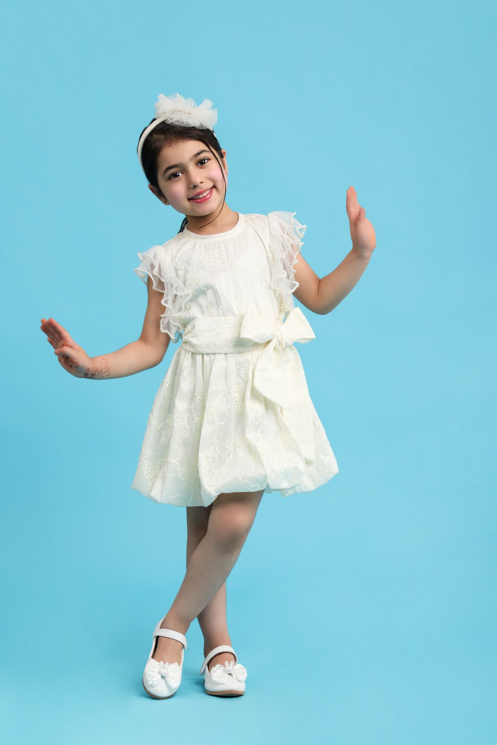 Fancy cream embroidered dress with tie up bow