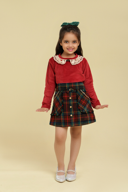 Maroon top with checkered skirt