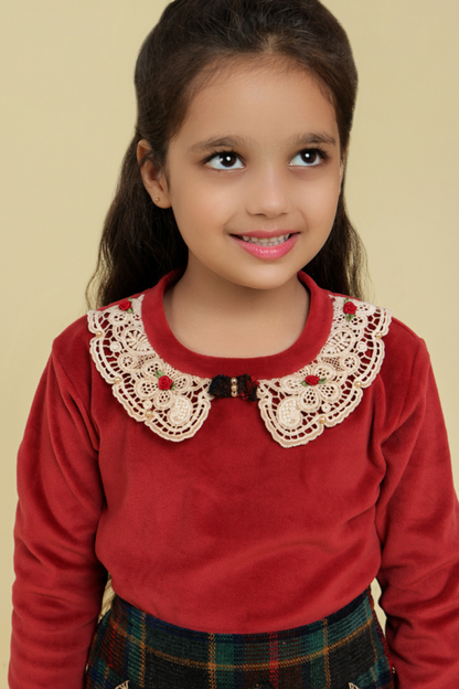 Maroon top with checkered skirt